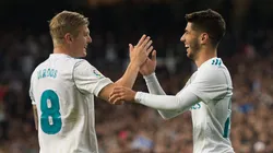 MADRID, SPAIN - NOVEMBER 05: Marco Asensio of Real Madrid CF celebrates with Toni Kroos after scoring his team's 2nd goal during the La Liga match between Real Madrid and Las Palmas at Estadio Santiago Bernabeu on November 5, 2017 in Madrid, Spain. (Photo by Denis Doyle/Getty Images)