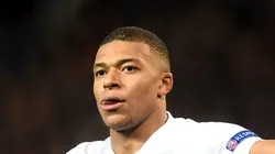 MANCHESTER, ENGLAND - FEBRUARY 12: Kylian Mbappe of PSG celebrates after scoring his sides second goal during the UEFA Champions League Round of 16 First Leg match between Manchester United and Paris Saint-Germain at Old Trafford on February 12, 2019 in Manchester, England. (Photo by Michael Regan/Getty Images)