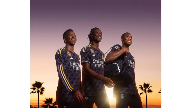 Jogadores do Real Madrid, Vini Jr, Camavinga e Alaba posam com o novo uniforme 2. Foto: Reprodução Site oficial Real Madrid