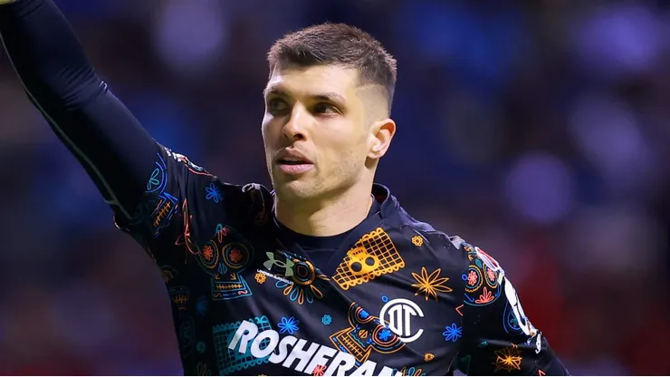 PUEBLA, MEXICO - APRIL 07: Tiago Volpi goalkeeper of Toluca celebrates after scoring the team's second goal during the 14th round match between Puebla and Toluca as part of the Torneo Clausura 2023 Liga MX at Cuauhtemoc Stadium on April 07, 2023 in Puebla, Mexico. (Photo by Hector Vivas/Getty Images)