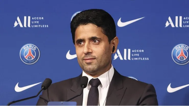 PARIS, FRANCE - AUGUST 11: Lionel Messi answers journalists with President Nasser Al Khelaifi during a conference of Paris Saint-Germain at Parc des Princes on August 11, 2021 in Paris, France. (Photo by Sebastien Muylaert/Getty Images)