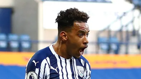 WEST BROMWICH, ENGLAND - APRIL 12: Matheus Pereira of West Bromwich Albion (L) celebrates after scoring their sides first goal with team mate Ainsley Maitland-Niles during the Premier League match between West Bromwich Albion and Southampton at The Hawthorns on April 12, 2021 in West Bromwich, England. Sporting stadiums around the UK remain under strict restrictions due to the Coronavirus Pandemic as Government social distancing laws prohibit fans inside venues resulting in games being played behind closed doors. (Photo by Michael Steele/Getty Images)
