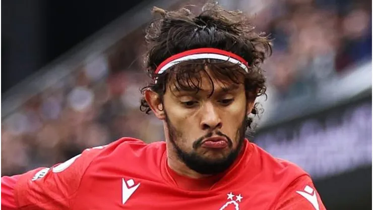 LONDON, ENGLAND - FEBRUARY 11: Gustavo Scarpa of Nottingham Forest battles for possession with Kenny Tete of Fulham during the Premier League match between Fulham FC and Nottingham Forest at Craven Cottage on February 11, 2023 in London, England. (Photo by Richard Heathcote/Getty Images)