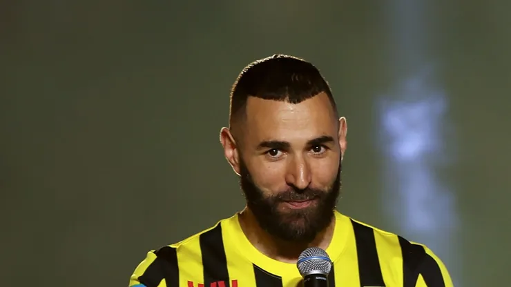 Karim Benzema speaks to the fans as they are presented to the crowd during the Karim Benzema Official Reception event at King Abdullah Sports City on June 08, 2023 in Jeddah, Saudi Arabia. (Photo by Yasser Bakhsh/Getty Images)