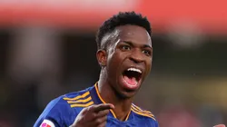 Vinicius Junior of Real Madrid celebrates after scoring their side's third goal during the La Liga Santander match between Granada CF and Real Madrid CF at Nuevo Estadio de Los Carmenes on November 21, 2021 in Granada, Spain. (Photo by Fran Santiago/Getty Images)