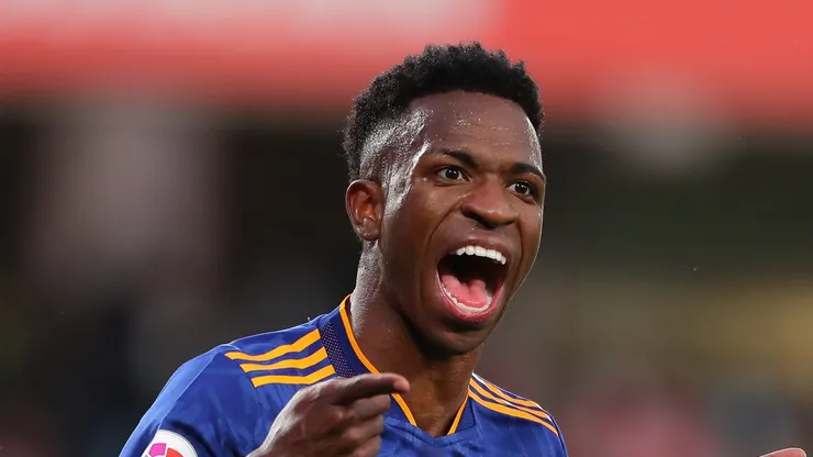 Vinicius Junior of Real Madrid celebrates after scoring their side's third goal during the La Liga Santander match between Granada CF and Real Madrid CF at Nuevo Estadio de Los Carmenes on November 21, 2021 in Granada, Spain. (Photo by Fran Santiago/Getty Images)