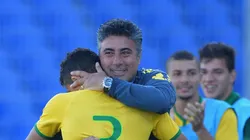 AVIGNON, FRANCE - JUNE 01: Head Coach Alexandre Gallo of Brazil hugs Marquinhos after he scores their third goal during the Final of the Toulon Tournament between France and Brazil at the Parc des Sports Avignon on June 1, 2014 in Avignon, France. (Photo by Christopher Lee/Getty Images)