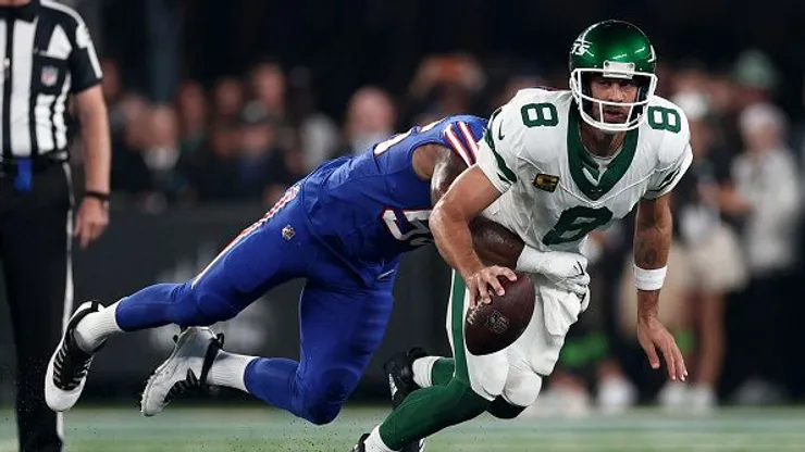 Rodgers sofrendo o tackle que causou a sua lesão