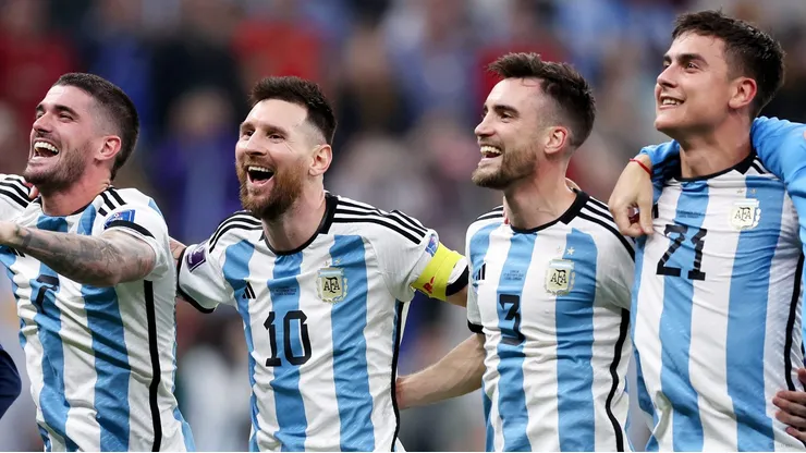 LUSAIL CITY, QATAR - DECEMBER 13: Rodrigo De Paul, Lionel Messi, Nicolas Tagliafico and Paulo Dybala of Argentina celebrate after the team's victory during the FIFA World Cup Qatar 2022 semi final match between Argentina and Croatia at Lusail Stadium on December 13, 2022 in Lusail City, Qatar. (Photo by Clive Brunskill/Getty Images)