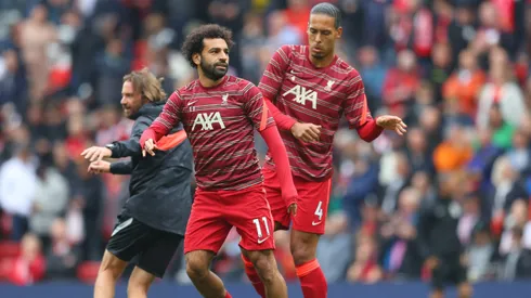 LIVERPOOL, ENGLAND - AUGUST 21: Mohamed Salah and Virgil van Dijk of Liverpool warm up prior to the Premier League match between Liverpool and Burnley at Anfield on August 21, 2021 in Liverpool, England. (Photo by Catherine Ivill/Getty Images)