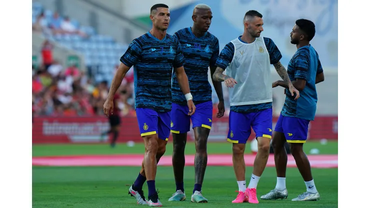 FARO, PORTUGAL - JULY 20: Cristiano Ronaldo of Al Nassr with teammates in action during the warm up before the start of the Pre-Season Friendly match between Al Nassr and SL Benfica at Estadio Algarve on July 20, 2023 in Faro, Portugal. (Photo by Gualter Fatia/Getty Images)