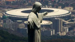 Cristo redentor com o Maracanã de fundo. Foto: Buda Mendes/Getty Images.