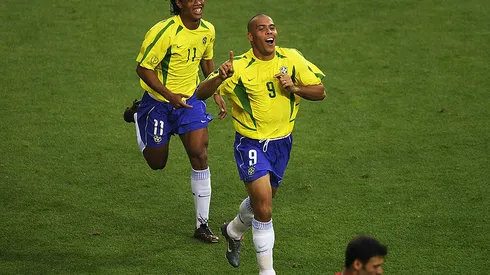 ULSAN - JUNE 3: Ronaldo (left) of Brazil celebrates scoring the equalising goal against Turkey with team mate Ronaldinho during the Group C match of the World Cup Group Stage played at the Ulsan-Munsu World Cup Stadium, Ulsan, South Korea on June 3, 2002. Brazil won the match 2-1. (Photo by Clive Brunskill/Getty Images)