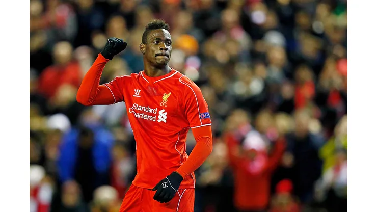 LIVERPOOL, ENGLAND - FEBRUARY 19: Mario Balotelli of Liverpool celebrates after scoring the opening goal from the penalty spot during the UEFA Europa League Round of 32 match between Liverpool FC and Besiktas JK at Anfield on February 19, 2015 in Liverpool, United Kingdom. (Photo by Julian Finney/Getty Images)