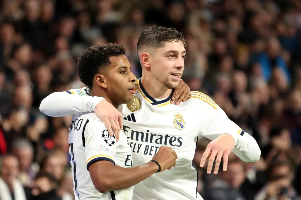 Rodrygo celebra gol do Real Madrid ao lado de Federico Valverde, na Champions(Foto: Florencia Tan Jun/Getty Images)