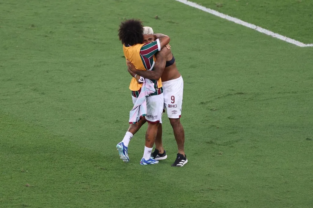 RIO DE JANEIRO, BRAZIL – NOVEMBER 04: Marcelo (L) of Fluminense celebrates with teammate John Kennedy after winning the final match of Copa CONMEBOL Libertadores 2023 between Fluminense and Boca Juniors at Maracana Stadium on November 04, 2023 in Rio de Janeiro, Brazil. (Photo by Lucas Figueiredo/Getty Images)