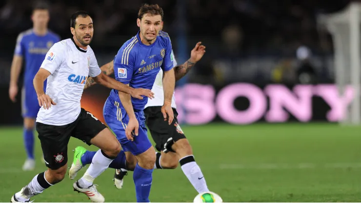 YOKOHAMA, JAPAN - DECEMBER 16: Branislav Ivanovic of Chelsea and Danilo of Corinthians chase the ball during the FIFA Club World Cup Final Match between Corinthians and Chelsea at International Stadium Yokohama on December 16, 2012 in Yokohama, Japan. (Photo by Kaz Photography/Getty Images)