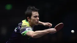 O brasileiro Hugo Calderano em disputa de torneio WTT Champions em Xinxiang, na China (Foto: Lintao Zhang/Getty Images)
