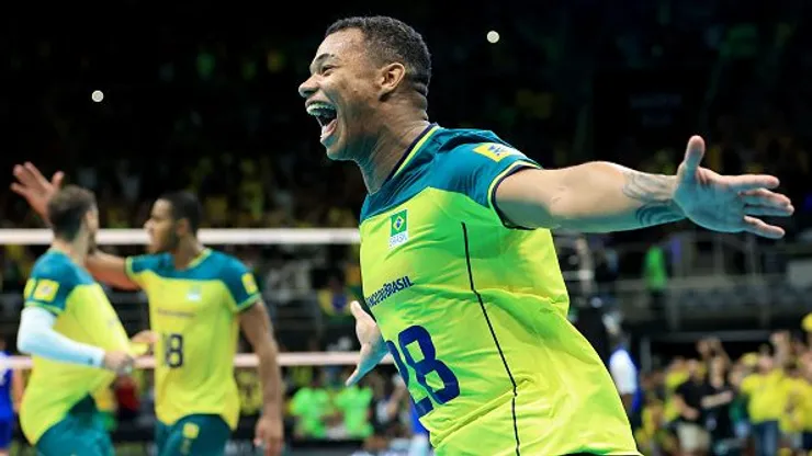 Darlan comemorando a vaga olímpica para a Seleção Brasileira de vôlei masculino. Foto: Buda Mendes/Getty Images