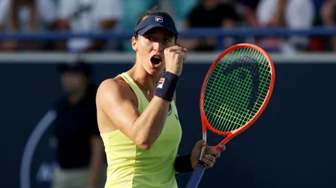 ABU DHABI, UNITED ARAB EMIRATES - FEBRUARY 12: Luisa Stefani of Brazil celebrates scoring a point while playing with Shuai Zhang of China against Shuko Aoyama of Japan and Hao-Ching Chan of Chinese Taipei during their Women's Doubles final match on Day 7 of the Mubadala Abu Dhabi Open, part of the Hologic WTA Tour, at Zayed Sports City on February 12, 2023 in Abu Dhabi, United Arab Emirates. (Photo by Christopher Pike/Getty Images)