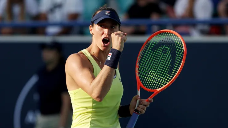 ABU DHABI, UNITED ARAB EMIRATES - FEBRUARY 12: Luisa Stefani of Brazil celebrates scoring a point while playing with Shuai Zhang of China against Shuko Aoyama of Japan and Hao-Ching Chan of Chinese Taipei during their Women's Doubles final match on Day 7 of the Mubadala Abu Dhabi Open, part of the Hologic WTA Tour, at Zayed Sports City on February 12, 2023 in Abu Dhabi, United Arab Emirates. (Photo by Christopher Pike/Getty Images)