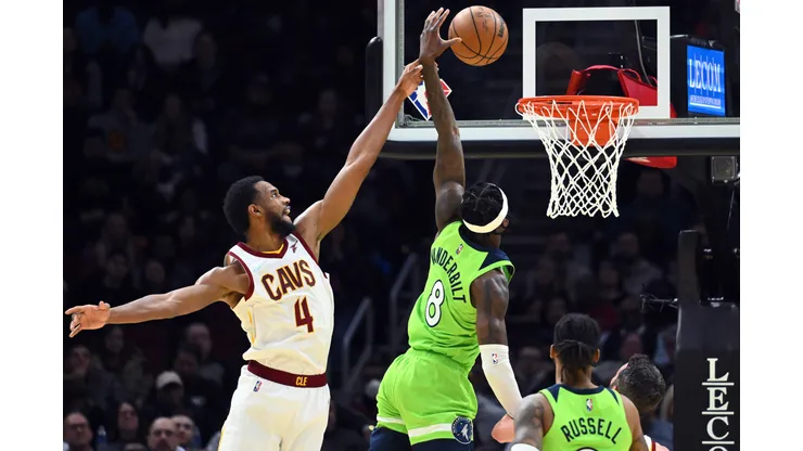 CLEVELAND, OHIO - FEBRUARY 28: Evan Mobley #4 of the Cleveland Cavaliers fouls Jarred Vanderbilt #8 of the Minnesota Timberwolves during the second half at Rocket Mortgage Fieldhouse on February 28, 2022 in Cleveland, Ohio. The Timberwolves defeated the Cavaliers 127-122. NOTE TO USER: User expressly acknowledges and agrees that, by downloading and/or using this photograph, user is consenting to the terms and conditions of the Getty Images License Agreement. (Photo by Jason Miller/Getty Images)