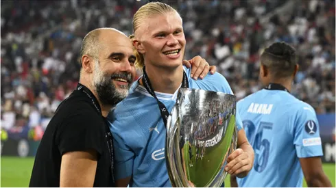 Pep Guardiola e Erling Haaland comemorando um título do Manchester Citý - Foto:Claudio Villa/Getty Images