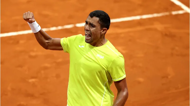 MADRID, SPAIN - APRIL 27: Thiago Monteiro of Brazil celebrates match point against Stefanos Tsitsipas of Greece in the Men's Singles Round of 64 match during Day Five of the Mutua Madrid Open at La Caja Magica on April 27, 2024 in Madrid, Spain. (Photo by Clive Brunskill/Getty Images)