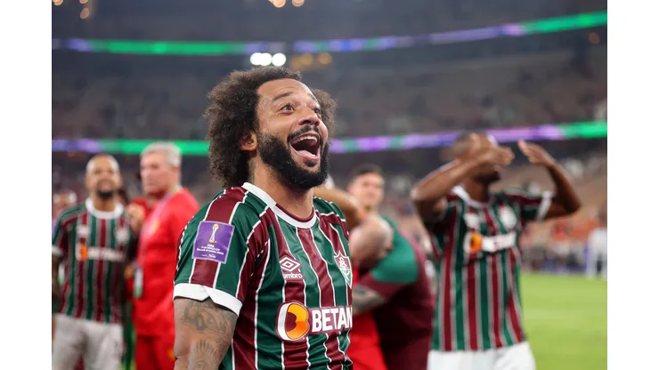 JEDDAH, SAUDI ARABIA - DECEMBER 18: Marcelo of Fluminense celebrates victory with teammates following the FIFA Club World Cup Semi-Final match between Fluminense and Al Ahly FC at King Abdullah Sports City on December 18, 2023 in Jeddah, Saudi Arabia. (Photo by Francois Nel/Getty Images)