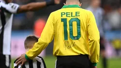 Getty Images/Stu Forster - Bruno Guimarães foi aplaudido em homenagem a Pelé