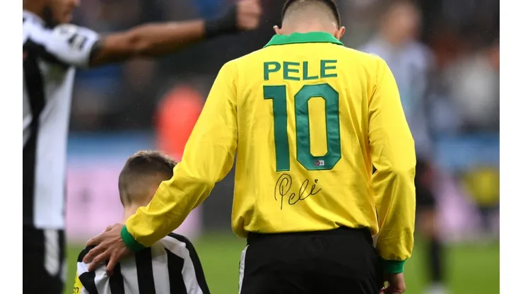 Getty Images/Stu Forster - Bruno Guimarães foi aplaudido em homenagem a Pelé