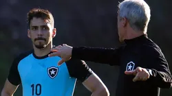 Foto: Vitor Silva/Botafogo/Divulgação - Eduardo e Luís Castro: meia confia na qualidade do elenco