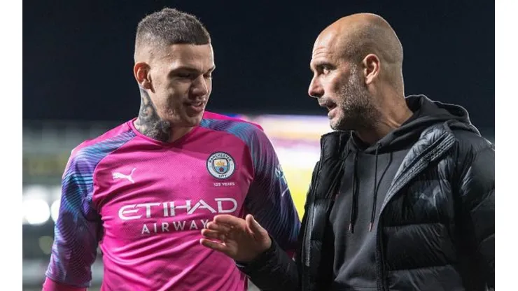 Sebastian Frej/MB Media/Getty Images - Ederson e Guardiola trabalham juntos no Manchester City