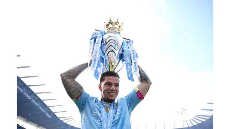MANCHESTER, ENGLAND - MAY 19: Ederson of Manchester City. celebrates with the Premier League Trophy after their team's victory during the Premier League match between Manchester City and West Ham United at Etihad Stadium on May 19, 2024 in Manchester, England. (Photo by Justin Setterfield/Getty Images)