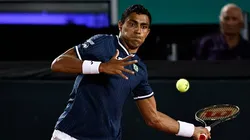 RIO DE JANEIRO, BRAZIL - MARCH 05: Thiago Monteiro of Brazil returns a shot against Jan-Lennard Struff of Germany during their singles match on Day One of the 2022 Davis Cup Qualifier at Parque Olímpico Arena Tenis on March 04, 2022 in Rio de Janeiro, Brazil. (Photo by Buda Mendes/Getty Images)