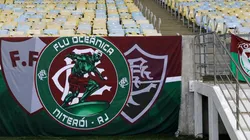 Silvia Izquierdo - Pool/Getty Images - Dois dos símbolos do Fluminense em uma bandeira do torcida tricolor