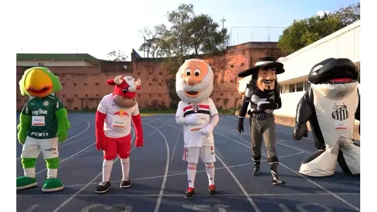 Mascotes se preparam para prova dos 100m rasos — Foto: Globo Esporte