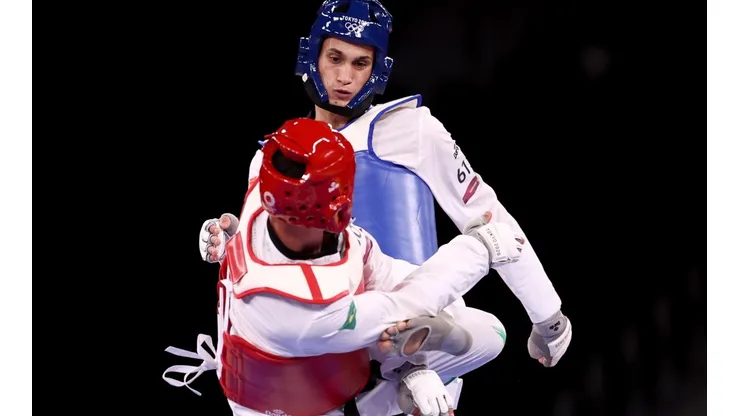Na foto, os taekwondistas Simone Alessio e Icaro Miguel, nos Jogos de Tóquio. (Foto: Getty Images)
