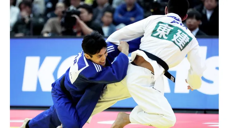 Eric Takabatake, com o quimono branco. (Foto: Getty Images)