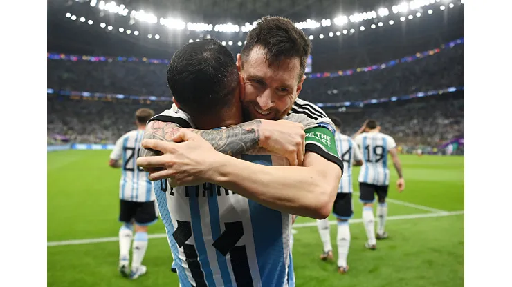 LUSAIL CITY, QATAR - NOVEMBER 26: Lionel Messi (R) of Argentina celebrates scoring their team's first goal with their teammate Angel Di Maria (L) during the FIFA World Cup Qatar 2022 Group C match between Argentina and Mexico at Lusail Stadium on November 26, 2022 in Lusail City, Qatar. (Photo by Dan Mullan/Getty Images)