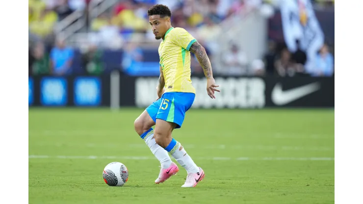ORLANDO, FLORIDA - JUNE 12: João Gomes #15 of Brazil passes the ball against the United States during the Continental Clasico 2024 game at Camping World Stadium on June 12, 2024 in Orlando, Florida. (Photo by Rich Storry/Getty Images)