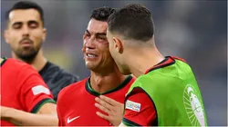 Foto: Justin Setterfield/Getty Images - Cristiano Ronaldo chorando após perder pênalti.