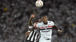 RIO DE JANEIRO, BRAZIL - SEPTEMBER 18: Robert Arboleda of Sao Paulo heads the ball against Thiago Almada of Botafogo during the Copa CONMEBOL Libertadores 2024 Quarterfinal match between Botafogo and Sao Paulo at Estadio Olímpico Nilton Santos on September 18, 2024 in Rio de Janeiro, Brazil. (Photo by Dhavid Normando/Getty Images)