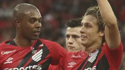 PR - CURITIBA - 14/04/2024 - BRASILEIRO A 2024, ATHLETICO-PR X CUIABA - Canobbio jogador do Athletico-PR comemora seu gol com Fernandinho jogador da sua equipe durante partida contra o Cuiaba no estadio Arena da Baixada pelo campeonato Brasileiro A 2024.