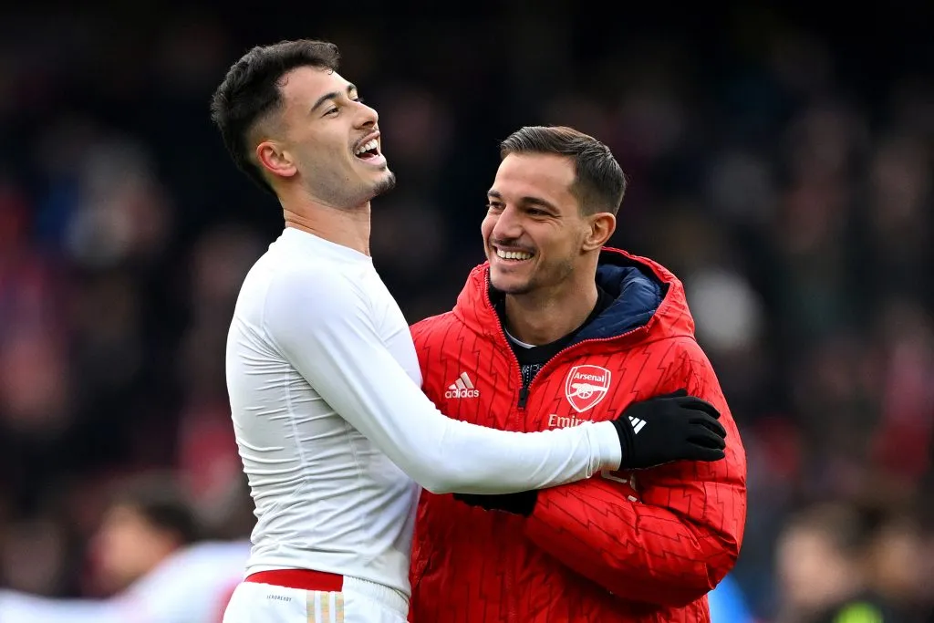 LONDON, ENGLAND – JANUARY 20: Gabriel Martinelli of Arsenal celebrates with teammate Cedric Soares following the team’s victory during the Premier League match between Arsenal FC and Crystal Palace at Emirates Stadium on January 20, 2024 in London, England. (Photo by Shaun Botterill/Getty Images)