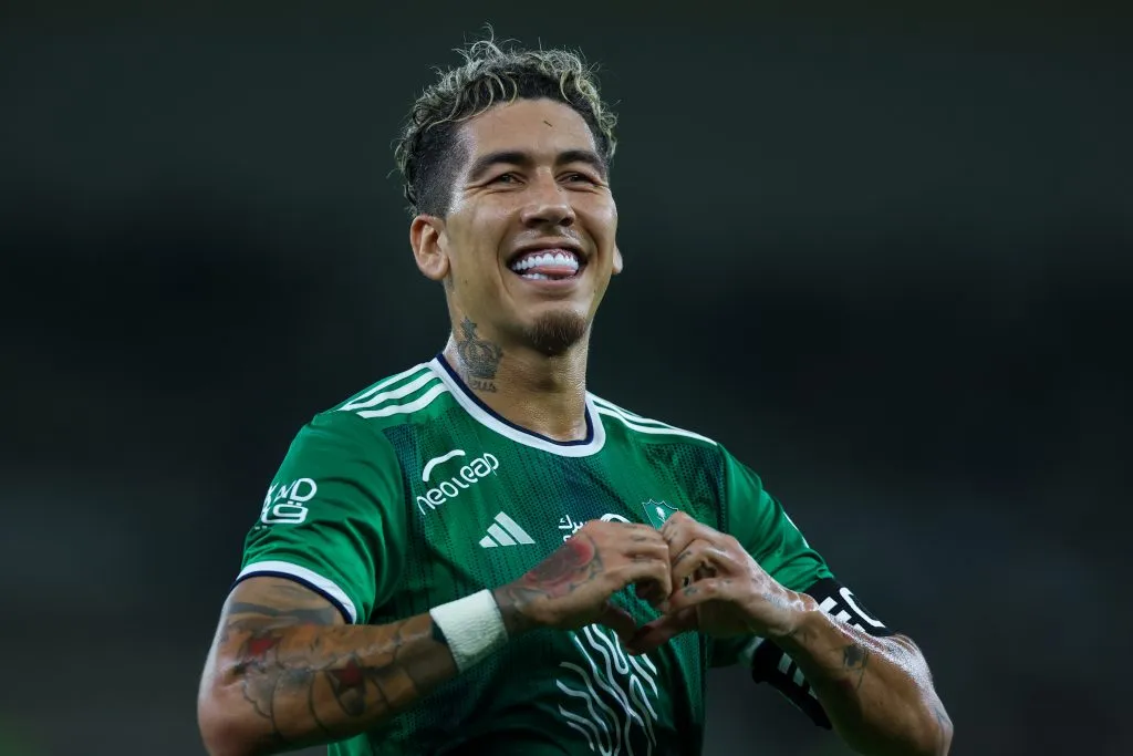 JEDDAH, SAUDI ARABIA – MAY 2: Roberto Firmino of Al Ahli celebrates after scoring the 4th goal during the Saudi Pro League match between Al-Ahli SFC and Damac FC at Prince Abduallah Al Faisal stadium on May 2, 2024 in Jeddah, Saudi Arabia.(Photo by Yasser Bakhsh/Getty Images)