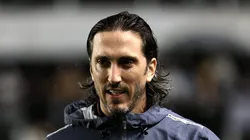 Zubeldía durante partida chuvosa na Baixada.