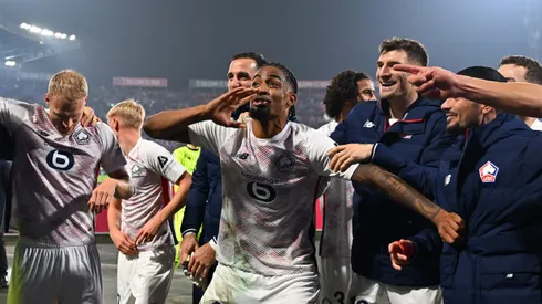 BOLOGNA, ITALY - NOVEMBER 27: Alexsandro of LOSC Lille celebrates victory at the end of the UEFA Champions League 2024/25 League Phase MD5 match between Bologna FC 1909 and LOSC Lille at Stadio Renato Dall'Ara on November 27, 2024 in Bologna, Italy. (Photo by Alessandro Sabattini/Getty Images)