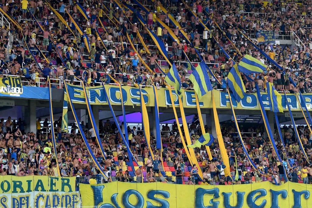 SANTIAGO DEL ESTERO, ARGENTINA – DECEMBER 16: Fans of Rosario Central cheer for their team prior the final match of Copa de la Liga Profesional 2023 between Rosario Central and Platense at Estadio Madre de Ciudades on December 16, 2023 in Santiago del Estero, Argentina. (Photo by Joaquín Camiletti/Getty Images)