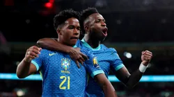 LONDON, ENGLAND - MARCH 23: Endrick of Brazil celebrates scoring his team's first goal with teammate Vinicius Junior during the international friendly match between England and Brazil at Wembley Stadium on March 23, 2024 in London, England. (Photo by Catherine Ivill/Getty Images)